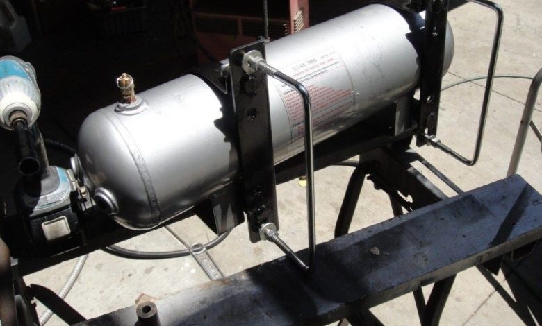 How often should truck air tanks be drained?