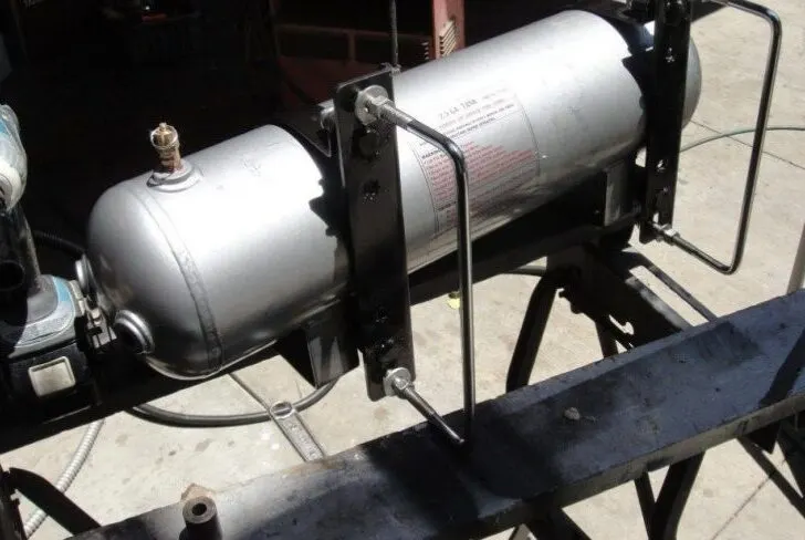 How often should truck air tanks be drained?