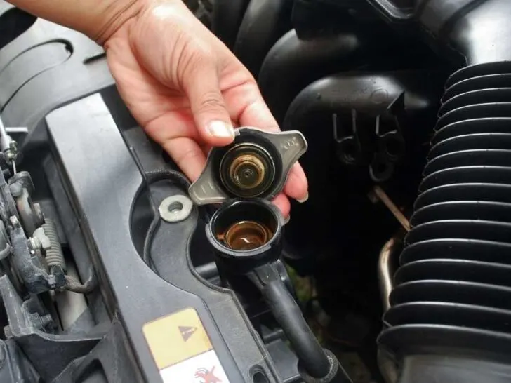 Why is My Coolant Reservoir Boiling and Overflowing?