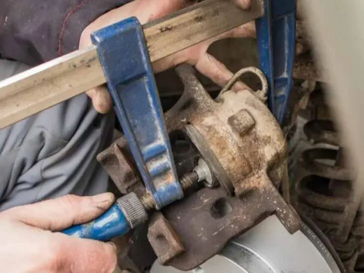 How Do You Compress a Brake Caliper Without Tools?