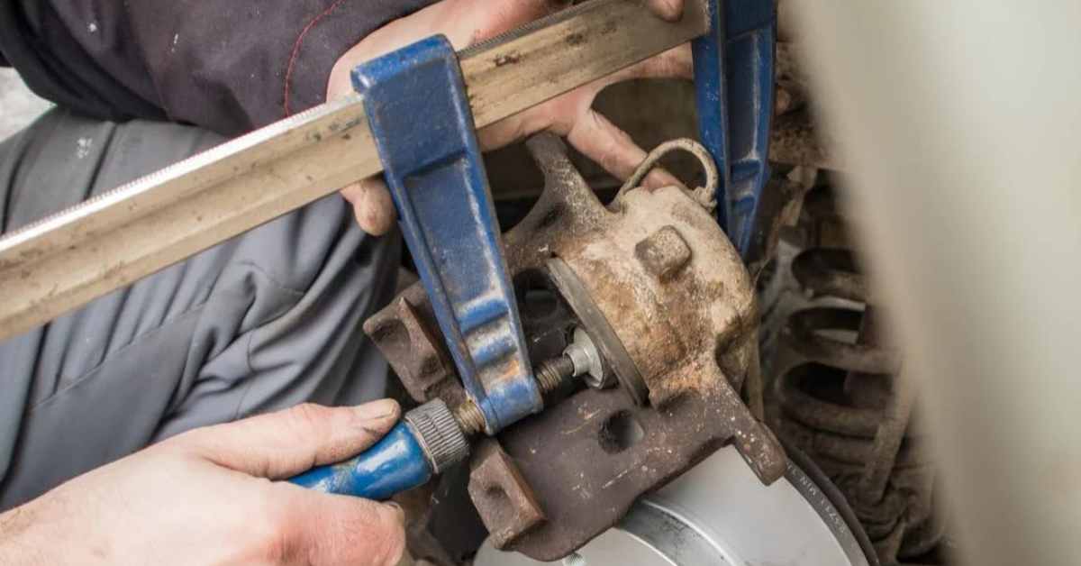 How Do You Compress a Brake Caliper Without Tools?