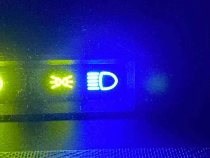 What Color is The High Beam Indicator Light?