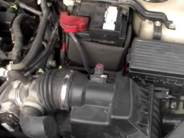 Where is the Starter on a 2012 Ford Fusion?